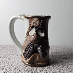 Rustic Ceramic Mug with Textured Design by Mahon Studio Art